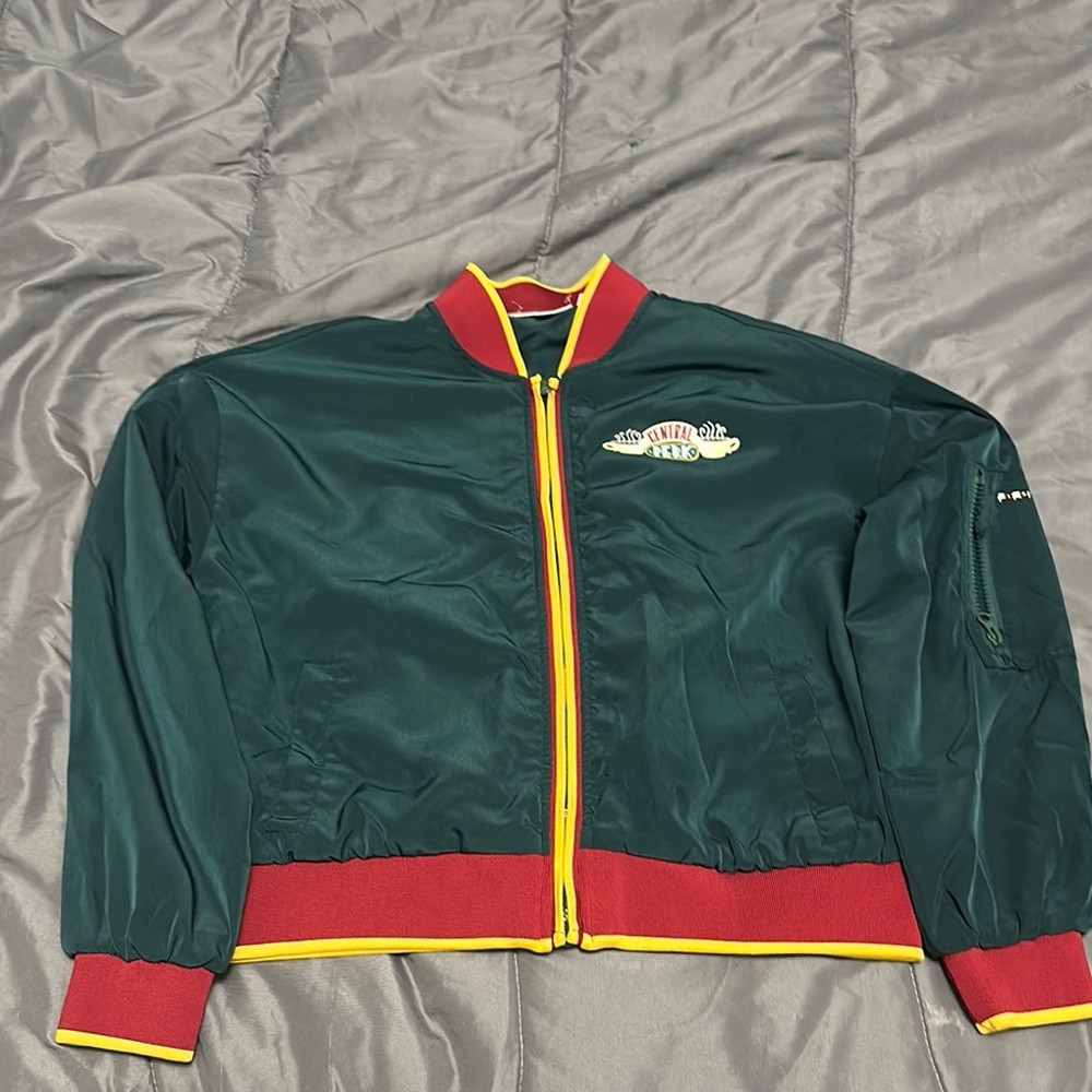 Green Bomber Jacket with Red and Yellow Accents